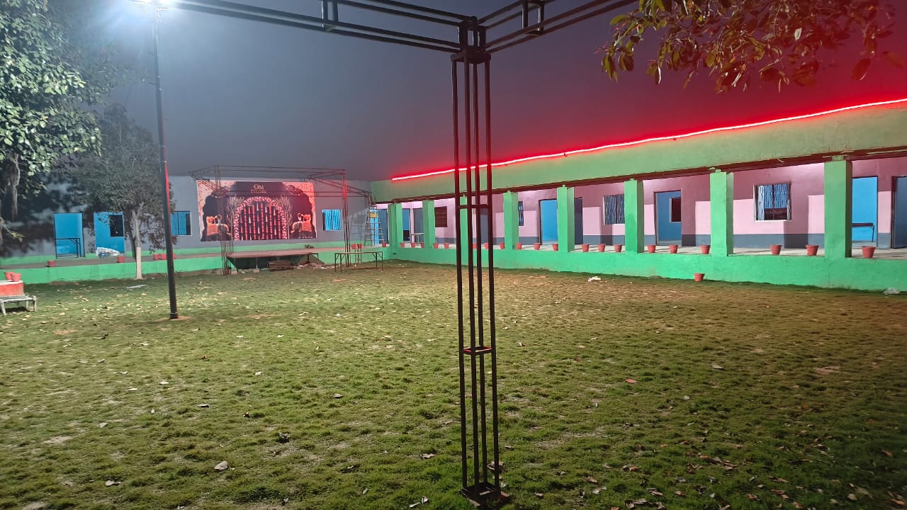 OM PARADISE Outdoor Venue with Evening Lighting